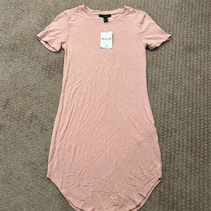 a light pink semi tight fit t-shirt style dress!